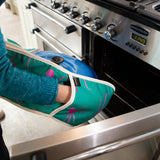 Octopus oven gloves holding pot