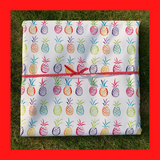 Pineapple wrapping paper on a present