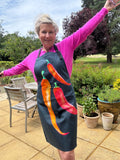 person wearing chillie apron