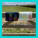 both colours of Oh so bright pineapple tea towel